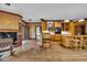 Large kitchen with wood floors, center island, ample cabinetry, and adjacent living area at 3659 Jordan Landing Rd., Murrells Inlet, SC 29576