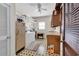 Functional laundry room with vintage appliances, ample shelving, and checkered tile flooring at 3659 Jordan Landing Rd., Murrells Inlet, SC 29576