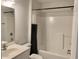 Cozy bathroom with a shower-tub combo and a stylish vanity at 3677 Clay Pond Village Ln. # 6, Myrtle Beach, SC 29579