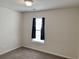 Bright bedroom features neutral walls, carpet flooring and a window bringing in natural light at 3677 Clay Pond Village Ln. # 6, Myrtle Beach, SC 29579