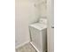 Laundry room featuring a washing machine and wire shelf at 3677 Clay Pond Village Ln. # 6, Myrtle Beach, SC 29579