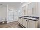 Modern bathroom with double sink vanity, toilet, and glass-enclosed shower at 3759 Green Sea Rd., Green Sea, SC 29545