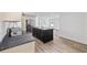 Bright kitchen features stainless appliances, grey countertops, and dark island at 3759 Green Sea Rd., Green Sea, SC 29545