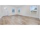 Well-lit room with wood-look floors and white walls next to the home's front door at 3759 Green Sea Rd., Green Sea, SC 29545