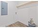 Utility room with wood look vinyl flooring and modern baseboards at 3759 Green Sea Rd., Green Sea, SC 29545