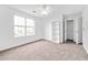 Bedroom with carpet, window, closet, and built-in shelving for ample storage and natural light at 3762 Citation Way # 1023, Myrtle Beach, SC 29577
