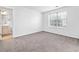 Well-lit bedroom with a large window and neutral carpeting provides ample natural light at 3762 Citation Way # 1023, Myrtle Beach, SC 29577