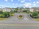 Aerial view of the community entrance with a well-manicured landscape and iron gate at 3762 Citation Way # 1023, Myrtle Beach, SC 29577