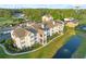 Aerial view of building featuring nice landscaping, pond with fountain, and outside patio spaces at 3762 Citation Way # 1023, Myrtle Beach, SC 29577