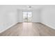 Bright and airy living room with a sliding glass door to the outdoor patio area at 3762 Citation Way # 1023, Myrtle Beach, SC 29577