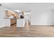 Bright living space with wood-look flooring and neutral paint, seamlessly connected to the kitchen at 3762 Citation Way # 1023, Myrtle Beach, SC 29577