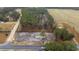 Property's location amongst tree clusters and open land at 3768 Green Sea Rd., Green Sea, SC 29545