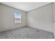 Bright bedroom featuring neutral walls, carpet flooring, and a window at 3768 Green Sea Rd., Green Sea, SC 29545