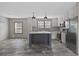 This spacious kitchen features stainless steel appliances, ample cabinetry, and a functional center island at 3768 Green Sea Rd., Green Sea, SC 29545