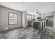Modern kitchen featuring stainless steel appliances, gray cabinets, and a stylish island at 3768 Green Sea Rd., Green Sea, SC 29545