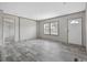 Bright living area showcasing grey wood-look flooring, neutral walls, and plenty of natural light at 3768 Green Sea Rd., Green Sea, SC 29545