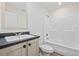 Clean bathroom with vanity, sink, mirror and shower-tub combination at 3772 Green Sea Rd., Green Sea, SC 29545
