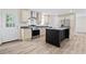 Contemporary kitchen boasting stainless steel appliances, shaker cabinets, and a functional island at 3772 Green Sea Rd., Green Sea, SC 29545