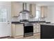 Stylish kitchen featuring a stainless steel range hood, modern appliances, and plenty of countertop space at 3772 Green Sea Rd., Green Sea, SC 29545