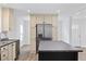 Modern kitchen featuring stainless steel appliances, a large island, and ample cabinet space at 3772 Green Sea Rd., Green Sea, SC 29545