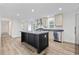 Well-equipped kitchen with a center island, stainless steel appliances, and ample cabinet storage at 3772 Green Sea Rd., Green Sea, SC 29545