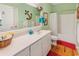 Bathroom with a vanity, bright lighting, and a bathtub with a shower at 3926 Flagg St., Murrells Inlet, SC 29576