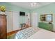 Well-lit bedroom with a closet and dresser provides comfortable accommodation and ample storage space at 3926 Flagg St., Murrells Inlet, SC 29576