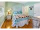 Cozy bedroom with a comfortable bed, natural light, and a private bathroom at 3926 Flagg St., Murrells Inlet, SC 29576