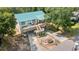 Charming two-story home with a spacious deck, a well-manicured lawn, and ample parking space at 3926 Flagg St., Murrells Inlet, SC 29576