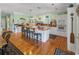 Bright and airy kitchen with a central island, hardwood floors, and modern appliances at 3926 Flagg St., Murrells Inlet, SC 29576