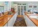 Well-equipped kitchen with wood countertops, modern appliances, and ample storage space at 3926 Flagg St., Murrells Inlet, SC 29576