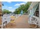 Relaxing outdoor deck with comfortable seating, perfect for enjoying the peaceful surroundings and fresh air at 3926 Flagg St., Murrells Inlet, SC 29576