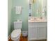 Well-lit powder room featuring a toilet, sink, and vanity at 3926 Flagg St., Murrells Inlet, SC 29576