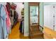 Open view of a walk-in closet featuring ample storage and an antique coat rack with a mirror at 3926 Flagg St., Murrells Inlet, SC 29576