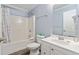Cozy bathroom with white fixtures including a vanity, toilet, and a shower/tub combination with a shower curtain at 400 Hillside Dr. S, North Myrtle Beach, SC 29582