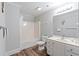 Bathroom featuring a shower-tub combo with a white curtain, white vanity, and toilet at 400 Hillside Dr. S, North Myrtle Beach, SC 29582