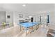 Game room boasts a ping pong table, foosball, and access to the kitchen and dining area at 400 Hillside Dr. S, North Myrtle Beach, SC 29582