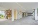 Spacious covered garage area, offering parking and access to stairs, for convenient entry and storage at 400 Hillside Dr. S, North Myrtle Beach, SC 29582