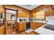 Well-equipped kitchen with wood cabinets, countertops, and modern appliances at 412 Carolina Dr., Loris, SC 29569