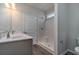Bathroom featuring walk-in shower, updated vanity, modern fixtures and natural light at 427 Lifestyle Court, Surfside Beach, SC 29575