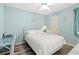 Comfortable bedroom with beach-themed decor, including a desk and white wicker furniture at 435 Ocean Creek Dr. # 2722, Myrtle Beach, SC 29572