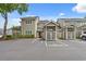 Condominium exterior with assigned parking and well-maintained landscaping at 435 Ocean Creek Dr. # 2722, Myrtle Beach, SC 29572