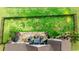 Aerial view of a fenced-in backyard and patio with furniture at 455 Hyacinth Loop, Murrells Inlet, SC 29576