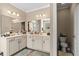Bathroom features and sinks with framed mirrors and natural light coming from the window at 455 Hyacinth Loop, Murrells Inlet, SC 29576