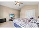 Bedroom featuring neutral walls and carpet with ceiling fan and television at 455 Hyacinth Loop, Murrells Inlet, SC 29576