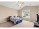 Bright bedroom featuring a ceiling fan, a large window and neutral paint at 455 Hyacinth Loop, Murrells Inlet, SC 29576
