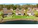 Aerial shot showcasing a house with backyard patio by the water at 455 Hyacinth Loop, Murrells Inlet, SC 29576