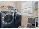 Laundry room featuring front loading washer and dryer, shelf and ladder at 455 Hyacinth Loop, Murrells Inlet, SC 29576