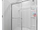 Clean and bright shower with glass doors and built-in shelving at 4927 Sandlewood Dr., Myrtle Beach, SC 29579