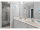 This bathroom has a double vanity with updated fixtures and a shower with a bathtub at 503 20Th Ave. N # 55B, North Myrtle Beach, SC 29582